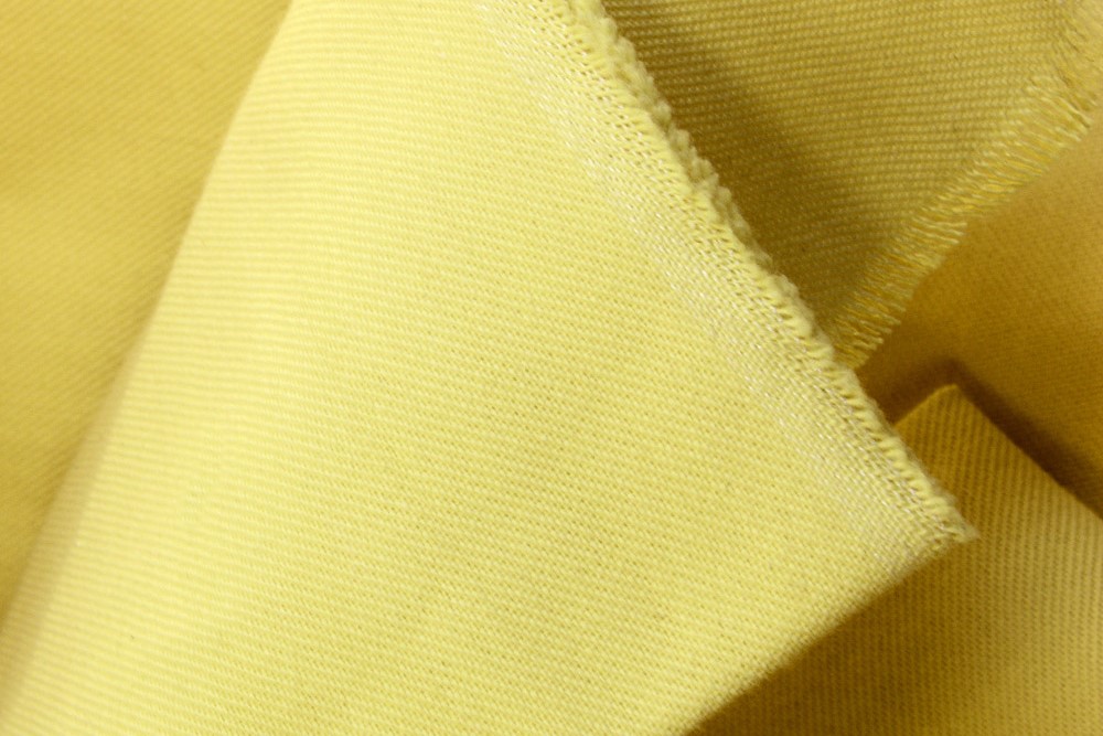 Item # 60-7, .007 thick Kevlar fabric Coated with PTFE On CS Hyde Company